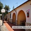 Villette con archi e tavolo esterno.